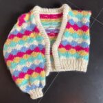 Tom Daley Instagram - ✌️Last year I knitted this for #DrJeanMilburn !! No spoilers but leave a 🧶 in the comments below if you’ve spotted it on #SexEducation Stay Tuned 🧡