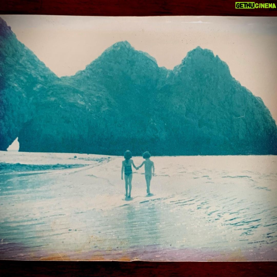Tom Ellis Instagram - Happy Birthday to my Big sister @annwenstone I love you so very much. This is my favorite photo of us having a stroll on the beach of #threecliffsbaygower about 10 years ago. Honest ❤️🥳