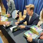 Tom Fletcher Instagram – That’s a lot of books! Thanks to @ourbookshoptring and @rosietellstales for hosting an awesome event for me at @tringschool today, and of course thanks to all the kids for listening to me chat about Christmas in October! 

They told me @jeffkinney signed this many books in under 30 minutes which sounded like a challenge to me. 😜 Did I break his record?!

#thechristmasaurus #christmasaurus #christmas #dinosaurs #books #childrensbooks