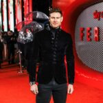 Tom Hopper Instagram - Fantastic evening at the @ferrarithemovie London premiere. Thank you to @johnvarvatos for the outfit 🙌🏼 Which, considering it was made of velvet, was surprisingly quite rain resistant on a ridiculously wet evening!🌧️ @millermode 🙏🏼💙 @breitling_uk @breitling ⌚️ Odeon Leicester Square