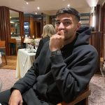Tommy Fury Instagram – The tension between me and getting a Christmas belly is high 🎄
