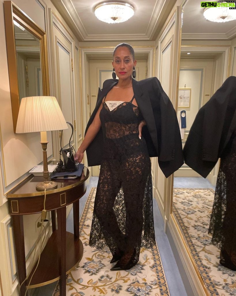Tracee Ellis Ross Instagram - The PURE JOY I get from playing in my closet and putting together a look! I bought these @ysl lace pants a while ago. Never wore em. Couldn’t figure em out. Then I bought this @prada lace dress and the stars aligned. Paired with my #bottega pumps, @araksofficial bra & panty, old Prada earrings and old SL tux jacket and my gawd …I felt like a dream. Thank you Paris for giving this look a chic back drop. It’s so good y’all might see this one again. Paris,France