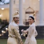 Tyas Mirasih Instagram – Here’s to love and laughter and happily ever after 💍

Well Organized by : @adara.wedding 
Venue @themanorandara
Photography & Videography : @morden.co @samuelrustandy @bychandrasusanto
Decoration & Tents : @classytentdecoration 
Carpets : @farahcarpetsofficial
Lighting : @uplightpro 
Make Up : @hepidavid 
Hair Do : @tominjoo 
Bride’s Attire for Akad Nikah &  Reception : @svarna_byikatindonesia @didietmaulana 
Bride’s Crown & Headpiece @rinaldyyunardi 
Jewelry : @adellejewellery
Bride’s Wedding Shoes : @regisbridalshoes 
Bride’s robe : @lucette_essie
Bride’s Nail art : @kookoo.nails 
Groom’s Attire for Akad Nikah &  Reception : @svarna_byikatindonesia @didietmaulana
Bride and Groom textile : @the.designerworkshop
Groom’s Hairstylist : @aryadillah_27
Makeup Mother of the groom & Sister of the bride : @wulanwidianto
Makeup sister of the groom :
@bonitaelisabeth.makeup @belovedbyhepidavid
Wedding Ring :  @adellejewellery 
Akad Catering : 
@teppanku 
@baksobuetu 
@gococo.indonesia 
@ponut.id 
@papo_id
@cantikaputricake
Reception Catering : @themanor.cafe
Akad Souvenir : @howelandco 
Reception Souvenir : @redribbongift @drzlim_official
Digital Invitation & Live streaming : @viding.co 
Mahar & Ring box : @jingga_seserahanmahar 
Bouquets : @faveur.florist 
Wedding Cake : @sweetsalt_id 
Birthday Cake : @RRCakes
Entertainment : @aqisinggih 
Sound system : @deoentertainmentindonesia
MC Akad & Reception :  @andrakarna
Usher : @beauty_usher
Photobooth : @theholograil 
Gift : @farahcarpetsofficial
@bardismarthome

#TEZIapbahagiainTYAS