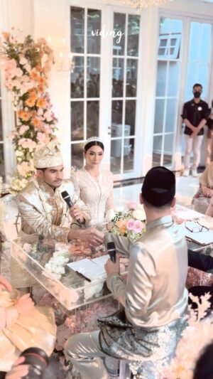 Tyas Mirasih Instagram - Happy Wedding untuk kak @tyasmirasih & @tengkutezi, terima kasih sudah mempercayakan @viding.co untuk layanan Undangan Digital, Buku Tamu Digital, dan Wedding Live Streaming, senang sekali bisa ikut bagian dalam moment bahaga pernikahan kak @tyasmirasih & @tengkutezi 

Sekali lagi selamag untuk pernikahannya

#BuatUndanganDigitalsemudahCANVA cuma di @viding.co !

Well Organized by : @adara.wedding 
Photography & Videography : @morden.co 
Decoration & Tents : @classytentdecoration 
Carpets : @farahcarpetsofficial
Lighting : @uplightpro 
Make Up : @hepidavid 
Hair Do : @tominjoo 
Bride’s Attire for Akad Nikah &  Reception : @svarna_byikatindonesia @didietmaulana 
Bride’s Crown & Headpiece @rinaldyyunardi 
Jewelry : @adellejewellery
Bride’s Wedding Shoes : @regisbridalshoes 
Bride’s robe : @lucette_essie
Groom’s Attire for Akad Nikah &  Reception : @svarna_byikatindonesia @didietmaulana 
Wedding Ring :  @adellejewellery 
Akad Catering : 
@teppanku 
@baksobuetu 
@gococo.indonesia 
@ponut.id 
@papo_id
@cantikaputricake
Reception Catering :  @themanorandara
Akad Souvenir : @howelandco 
Reception Souvenir : @redribbongift 
Digital Invitation, Buku Tamu Digital & Live streaming : @viding.co 
Mahar & Ring box : @jingga_seserahanmahar 
Bouquets : @faveur.florist 
Wedding Cake : @sweetsalt_id 
Entertainment : @aqisinggih 
MC Akad & Reception :  @andrakarna
Usher : @beauty_usher
Photobooth : @theholograil 
Nail art : @kookoo.nails 
Venue : @themanorandara

#TEZIapbahagiainTYAS