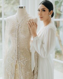 Tyas Mirasih Instagram - Glitter in simplicity 💍 Well Organized by : @adara.wedding Venue @themanorandara Photography & Videography : @morden.co @samuelrustandy @bychandrasusanto Decoration & Tents : @classytentdecoration Carpets : @farahcarpetsofficial Lighting : @uplightpro Make Up : @hepidavid Hair Do : @tominjoo Bride's Attire for Akad Nikah & Reception : @svarna_byikatindonesia @didietmaulana Bride’s Crown & Headpiece @rinaldyyunardi Jewelry : @adellejewellery Bride's Wedding Shoes : @regisbridalshoes Bride's robe : @lucette_essie Bride's Nail art : @kookoo.nails Groom's Attire for Akad Nikah & Reception : @svarna_byikatindonesia @didietmaulana Bride and Groom textile : @the.designerworkshop Groom's Hairstylist : @aryadillah_27 Makeup Mother of the groom & Sister of the bride : @wulanwidianto Makeup sister of the groom : @bonitaelisabeth.makeup @belovedbyhepidavid Wedding Ring : @adellejewellery Akad Catering : @teppanku @baksobuetu @gococo.indonesia @ponut.id @papo_id @cantikaputricake Reception Catering : @themanor.cafe Akad Souvenir : @howelandco Reception Souvenir : @redribbongift @drzlim_official Digital Invitation & Live streaming : @viding.co Mahar & Ring box : @jingga_seserahanmahar Bouquets : @faveur.florist Wedding Cake : @sweetsalt_id Birthday Cake : @RRCakes Entertainment : @aqisinggih Sound system : @deoentertainmentindonesia MC Akad & Reception : @andrakarna Usher : @beauty_usher Photobooth : @theholograil Gift : @farahcarpetsofficial @bardismarthome #TEZIapbahagiainTYAS The Manor Andara