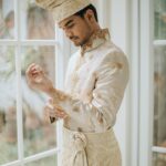 Tyas Mirasih Instagram – My heart made its choice and it chose you 💍

Well Organized by : @adara.wedding 
Venue @themanorandara
Photography & Videography : @morden.co @samuelrustandy @bychandrasusanto
Decoration & Tents : @classytentdecoration 
Carpets : @farahcarpetsofficial
Lighting : @uplightpro 
Make Up : @hepidavid 
Hair Do : @tominjoo 
Bride’s Attire for Akad Nikah &  Reception : @svarna_byikatindonesia @didietmaulana 
Bride’s Crown & Headpiece @rinaldyyunardi 
Jewelry : @adellejewellery
Bride’s Wedding Shoes : @regisbridalshoes 
Bride’s robe : @lucette_essie
Bride’s Nail art : @kookoo.nails 
Groom’s Attire for Akad Nikah &  Reception : @svarna_byikatindonesia @didietmaulana
Bride and Groom textile : @the.designerworkshop
Groom’s Hairstylist : @aryadillah_27
Makeup Mother of the groom & Sister of the bride : @wulanwidianto
Makeup sister of the groom :
@bonitaelisabeth.makeup @belovedbyhepidavid
Wedding Ring :  @adellejewellery 
Akad Catering : 
@teppanku 
@baksobuetu 
@gococo.indonesia 
@ponut.id 
@papo_id
@cantikaputricake
Reception Catering : @themanor.cafe
Akad Souvenir : @howelandco 
Reception Souvenir : @redribbongift @drzlim_official
Digital Invitation & Live streaming : @viding.co 
Mahar & Ring box : @jingga_seserahanmahar 
Bouquets : @faveur.florist 
Wedding Cake : @sweetsalt_id 
Birthday Cake : @RRCakes
Entertainment : @aqisinggih 
Sound system : @deoentertainmentindonesia
MC Akad & Reception :  @andrakarna
Usher : @beauty_usher
Photobooth : @theholograil 
Gift : @farahcarpetsofficial
@bardismarthome

#TEZIapbahagiainTYAS The Manor Andara