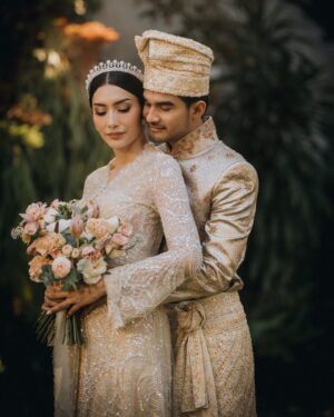 Tyas Mirasih Instagram - Hand in hand. You & me.
Today, tomorrow,forever 💍

Well Organized by : @adara.wedding 
Venue @themanorandara
Photography & Videography : @morden.co @samuelrustandy @bychandrasusanto
Decoration & Tents : @classytentdecoration 
Carpets : @farahcarpetsofficial
Lighting : @uplightpro 
Make Up : @hepidavid 
Hair Do : @tominjoo 
Bride's Attire for Akad Nikah &  Reception : @svarna_byikatindonesia @didietmaulana 
Bride’s Crown & Headpiece @rinaldyyunardi 
Jewelry : @adellejewellery
Bride's Wedding Shoes : @regisbridalshoes 
Bride's robe : @lucette_essie
Bride's Nail art : @kookoo.nails 
Groom's Attire for Akad Nikah &  Reception : @svarna_byikatindonesia @didietmaulana
Bride and Groom textile : @the.designerworkshop
Groom's Hairstylist : @aryadillah_27
Mother Makeup : @wulanwidianto
Sister Makeup :
@bonitaelisabeth.makeup @belovedbyhepidavid
Wedding Ring :  @adellejewellery 
Akad Catering : 
@teppanku 
@baksobuetu 
@gococo.indonesia 
@ponut.id 
@papo_id
@cantikaputricake
Reception Catering : @themanor.cafe
Akad Souvenir : @howelandco 
Reception Souvenir : @redribbongift @drzlim_official
Digital Invitation & Live streaming : @viding.co 
Mahar & Ring box : @jingga_seserahanmahar 
Bouquets : @faveur.florist 
Wedding Cake : @sweetsalt_id 
Birthday Cake : @RRCakes
Entertainment : @aqisinggih 
Sound system : @deoentertainmentindonesia
MC Akad & Reception :  @andrakarna
Usher : @beauty_usher
Photobooth : @theholograil 
Gift : @farahcarpetsofficial
@bardismarthome

#TEZIapbahagiainTYAS