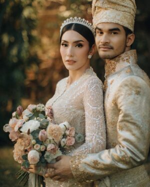 Tyas Mirasih Instagram - Hand in hand. You & me.
Today, tomorrow,forever 💍

Well Organized by : @adara.wedding 
Venue @themanorandara
Photography & Videography : @morden.co @samuelrustandy @bychandrasusanto
Decoration & Tents : @classytentdecoration 
Carpets : @farahcarpetsofficial
Lighting : @uplightpro 
Make Up : @hepidavid 
Hair Do : @tominjoo 
Bride's Attire for Akad Nikah &  Reception : @svarna_byikatindonesia @didietmaulana 
Bride’s Crown & Headpiece @rinaldyyunardi 
Jewelry : @adellejewellery
Bride's Wedding Shoes : @regisbridalshoes 
Bride's robe : @lucette_essie
Bride's Nail art : @kookoo.nails 
Groom's Attire for Akad Nikah &  Reception : @svarna_byikatindonesia @didietmaulana
Bride and Groom textile : @the.designerworkshop
Groom's Hairstylist : @aryadillah_27
Mother Makeup : @wulanwidianto
Sister Makeup :
@bonitaelisabeth.makeup @belovedbyhepidavid
Wedding Ring :  @adellejewellery 
Akad Catering : 
@teppanku 
@baksobuetu 
@gococo.indonesia 
@ponut.id 
@papo_id
@cantikaputricake
Reception Catering : @themanor.cafe
Akad Souvenir : @howelandco 
Reception Souvenir : @redribbongift @drzlim_official
Digital Invitation & Live streaming : @viding.co 
Mahar & Ring box : @jingga_seserahanmahar 
Bouquets : @faveur.florist 
Wedding Cake : @sweetsalt_id 
Birthday Cake : @RRCakes
Entertainment : @aqisinggih 
Sound system : @deoentertainmentindonesia
MC Akad & Reception :  @andrakarna
Usher : @beauty_usher
Photobooth : @theholograil 
Gift : @farahcarpetsofficial
@bardismarthome

#TEZIapbahagiainTYAS