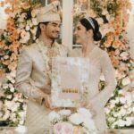 Tyas Mirasih Instagram – No longer two but one đź’Ť
Well Organized by : @adara.wedding
Venue @themanorandara
Photography & Videography : @morden.co @samuelrustandy @bychandrasusanto
Decoration & Tents : @classytentdecoration
Carpets : @farahcarpetsofficial
Lighting : @uplightpro
Make Up : @hepidavid
Hair Do : @tominjoo
Bride’s Attire for Akad Nikah & Reception : @svarna_byikatindonesia @didietmaulana
Bride’s Crown & Headpiece @rinaldyyunardi
Jewelry : @adellejewellery
Bride’s Wedding Shoes : @regisbridalshoes
Bride’s robe : @lucette_essie
Bride’s Nail art : @kookoo.nails
Groom’s Attire for Akad Nikah & Reception : @svarna_byikatindonesia @didietmaulana
Bride and Groom textile : @the.designerworkshop
Groom’s Hairstylist : @aryadillah_27
Mother Makeup : @wulanwidianto
Sister Makeup :
@bonitaelisabeth.makeup @belovedbyhepidavid
Wedding Ring : @adellejewellery
Akad Catering :
@teppanku
@baksobuetu
@gococo.indonesia
@ponut.id
@papo_id
@cantikaputricake
Reception Catering : @themanor.cafe
Akad Souvenir : @howelandco
Reception Souvenir : @redribbongift @drzlim_official
Digital Invitation & Live streaming : @viding.co
Mahar & Ring box : @jingga_seserahanmahar
Bouquets : @faveur.florist
Wedding Cake : @sweetsalt_id
Birthday Cake : @RRCakes
Entertainment : @aqisinggih
Sound system : @deoentertainmentindonesia
MC Akad & Reception : @andrakarna
Usher : @beauty_usher
Photobooth : @theholograil
Gift : @farahcarpetsofficial
@bardismarthome
#TEZIapbahagiainTYAS The Manor Andara