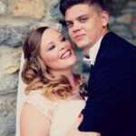Tyler Baltierra Instagram – @catelynnmtv Today marks 8 YEARS MARRIED & 17 YEARS together babe & I wouldn’t want to do this life with anyone else by my side! You know there will never be enough words to express the love I have for you…but I like to try anyway

There’s a place I like to go
Where the loud voices
In my head turn to smoke
Where rebellious wildflowers
Still grow through the snow
& bloom continuously in the cold 
A place where I feel whole
Where I can breathe slow
& recall the feeling of hope
It’s the only place
That’s ever felt like home
& It’s a place you already know
Where there are no rules etched
In stone besides our own
It’s the safest place
Where there is no harm
& that place is anywhere
& everywhere…
Because that place
Is with you in my arms
With your hourglass figure
That stops time all together
As I count every freckle
& caress every dimple
Your body becomes nimble
Our love is not simple
Not easy to measure
So relinquish control
While I fill you with the
Pressure of blissful pleasure
As we weave our pure love
Into beautiful silk together

Happy Anniversary honey, I love you so much & I’m so proud of the woman, mother & wife you’ve become. We’ve officially been together for MORE than HALF of our LIVES & I can’t wait to spend the rest of mine with you! #Soulmate #17YearsStrong #MiddleSchoolSweethearts 😍❤️🥹