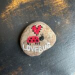 Tyler Hoechlin Instagram - Novel, but worth it! Before the season finale of Superman & Lois tonight, I wanted to share something that happened this weekend that I believe exemplifies what Superman is all about. I was on vacation with my family & while we were at the beach, a young man walked up to us & asked if we wanted to buy a rock he had painted. He started into an elaborate story about a man who wanted to purchase the rock for $100, but of course, wasn’t there that day. So, he said he’d give me deal & sell it to me for $5. I asked him questions about his career as a budding artist/what he wanted the money for (answer: “Arcades & other stuff.”). After about 10 minutes, I decided to reward his bold & imaginative efforts with the purchase of this rock. I gave him a $10 bill & without missing a beat he said, “Thanks for the tip!” He ran off to join his buddies waiting for him at the boardwalk & off they went to the arcade, I assumed. On our way to dinner, we passed him & his friends (more of them now) still at the beach & with an extensive selection of painted rocks being offered for “donations”. After I stopped to ask for a picture (I thought it would be a nice companion piece to go along with the story), we were told by a young girl that all the proceeds were going to a foundation in their friend’s name for pediatric brain cancer research, of which their friend had passed away from a few years ago. Their parents told us they had been encouraging the kids to enjoy their vacation at the beach, but the kids had insisted that THIS is what they wanted to do. My other family members quickly joined in with donations of their own. The next day, I passed by one of the parents & asked if I could share this story & she said, “absolutely.” Dexter, thank you for the art rock. It will forever be proudly displayed in my home & I will relish the chance to tell this story to anyone who asks me about it. To me, Superman isn’t Superman because he can do everything. It’s because he does anything good that he can whenever he has the chance. That he’s a friend when friends are needed. And that’s what these Super young people were doing. So I tip my cap to them for doing good, and for being good friends.
