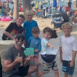 Tyler Hoechlin Instagram - Novel, but worth it! Before the season finale of Superman & Lois tonight, I wanted to share something that happened this weekend that I believe exemplifies what Superman is all about. I was on vacation with my family & while we were at the beach, a young man walked up to us & asked if we wanted to buy a rock he had painted. He started into an elaborate story about a man who wanted to purchase the rock for $100, but of course, wasn’t there that day. So, he said he’d give me deal & sell it to me for $5. I asked him questions about his career as a budding artist/what he wanted the money for (answer: “Arcades & other stuff.”). After about 10 minutes, I decided to reward his bold & imaginative efforts with the purchase of this rock. I gave him a $10 bill & without missing a beat he said, “Thanks for the tip!” He ran off to join his buddies waiting for him at the boardwalk & off they went to the arcade, I assumed. On our way to dinner, we passed him & his friends (more of them now) still at the beach & with an extensive selection of painted rocks being offered for “donations”. After I stopped to ask for a picture (I thought it would be a nice companion piece to go along with the story), we were told by a young girl that all the proceeds were going to a foundation in their friend’s name for pediatric brain cancer research, of which their friend had passed away from a few years ago. Their parents told us they had been encouraging the kids to enjoy their vacation at the beach, but the kids had insisted that THIS is what they wanted to do. My other family members quickly joined in with donations of their own. The next day, I passed by one of the parents & asked if I could share this story & she said, “absolutely.” Dexter, thank you for the art rock. It will forever be proudly displayed in my home & I will relish the chance to tell this story to anyone who asks me about it. To me, Superman isn’t Superman because he can do everything. It’s because he does anything good that he can whenever he has the chance. That he’s a friend when friends are needed. And that’s what these Super young people were doing. So I tip my cap to them for doing good, and for being good friends.