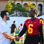 Tyler Hoechlin Instagram - Moments away from kickoff! Can’t wait to see what happens in college football this season. Got to meet some of the talented young men representing @uscfb and @usc_athletics this season. Fight on, Trojans! ✌🏼 @anthony_lucas22 @lakemcree @jake.jensen17