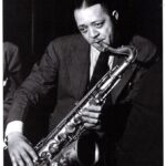 Tyler James Williams Instagram - Lester Young. A name I was not familiar with until @usvsbillieholiday . As I began to dig and find out as much information as I could about this man I realized he had already influenced my everyday life. Before Lester “bread” was only a food, a “crib” was only something you placed a baby in and “cool” was an approximate temperature. So if you understand what I mean when I say “ I’m just at the crib trying to get my bread right so I can step out looking cool” - that’s Lester. He coined these terms and pioneered the vernacular of the culture. He changed the way people not only heard the tenor saxophone but also how they played it. His note choice specific and airy. Choosing to float on top of rhythm rather than cut through it. Often turning his mouth piece, not just to add his only personal swag to the instrument, but to adjust his play and strengthen his unmatched stamina. But what hit me the most was the way others spoke of his love for Billie. Lady, as he called her. That perhaps, was the most impressive. After we all pass, we expect people to speak on how we loved our families or our significant others but this type of plutonic love doesn’t get mentioned as much. Personally I don’t think we have enough depictions in the media of plutonic love between men and women. The beauty in that simply resonates differently. That love was something I really wanted to capture. Felt compelled to capture. . . . @usvsbillieholiday comes out in 2 days on Feb. 26th on @hulu. I hope you’ll take some time to watch and appreciate Billie, Lester and all of the other often unsung black people in not only Billie’s life but this time. #usvsbillieholiday #blackhistorymonth