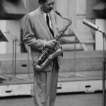 Tyler James Williams Instagram - Lester Young. A name I was not familiar with until @usvsbillieholiday . As I began to dig and find out as much information as I could about this man I realized he had already influenced my everyday life. Before Lester “bread” was only a food, a “crib” was only something you placed a baby in and “cool” was an approximate temperature. So if you understand what I mean when I say “ I’m just at the crib trying to get my bread right so I can step out looking cool” - that’s Lester. He coined these terms and pioneered the vernacular of the culture. He changed the way people not only heard the tenor saxophone but also how they played it. His note choice specific and airy. Choosing to float on top of rhythm rather than cut through it. Often turning his mouth piece, not just to add his only personal swag to the instrument, but to adjust his play and strengthen his unmatched stamina. But what hit me the most was the way others spoke of his love for Billie. Lady, as he called her. That perhaps, was the most impressive. After we all pass, we expect people to speak on how we loved our families or our significant others but this type of plutonic love doesn’t get mentioned as much. Personally I don’t think we have enough depictions in the media of plutonic love between men and women. The beauty in that simply resonates differently. That love was something I really wanted to capture. Felt compelled to capture. . . . @usvsbillieholiday comes out in 2 days on Feb. 26th on @hulu. I hope you’ll take some time to watch and appreciate Billie, Lester and all of the other often unsung black people in not only Billie’s life but this time. #usvsbillieholiday #blackhistorymonth