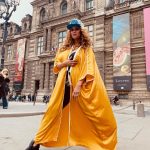 Tyra Banks Instagram - As a teenager, I walked the streets of Paris, going from casting to casting, hoping to get chosen. Cut to decades later… Moments after the @louisvuitton x @kidsuper men’s fashion show, and I have no shame in getting my pose on in front of the @museelouvre rocking a Louis cap Colm gave me and a golden kaftan I picked up from an Abu Dhabi desert hotel gift shop. Every #Paris street is a photo studio. Remember that. 💪🏽🇫🇷📸
