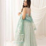 Ushna Shah Instagram - [#ad shot 08.10.23 - release date is today] Stepping into the season with grace and style in @asifanabeel ‘Barasti’ budget friendly unstitched festive collection ✨ Affordable glamour at its best! Launching Soon. #asifaandnabeel #asifanabeel #festivecollection #festivewear #fashion #love #asianwedding #weddingwear #AffordableGlam #FestiveFashion reel: @anzak.studio