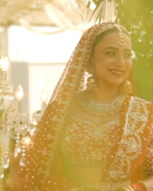 Ushna Shah Instagram - Our forever begins. We are so grateful for the abundance of love we have received from all over the world. Please allow me to formally introduce my husband:

His name is Hamza Amin, he is obviously very easy on the eyes, but that doesn’t even scratch the surface. He is an incredibly kind, loving, romantic, hard working, passionate, honest, witty, hilarious, intelligent, disciplined, fun and generous soul with far too many qualities to write here.. I am blessed to have him as my other half and my best friend for life. 

“And they lived happily ever after” ♥️

🎥 📸 
1-4: @mahasphotographyofficial 
5-8: @thrupolaroids 
(Like how I snuck in the Shendi reel at the end🤭)

(PS. I still haven’t posted my 🇦🇹 👰🏻‍♀️ look, I’ll get around to that soon).

My hair & makeup for the waleema by my lovely chacha-in-law, the great @tariqaminofficial 🤗 

#hamush @hamza.amin87