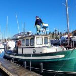 Valentina Shevchenko Instagram - I was missing my lovely #NordicTug so much 😍 Taking care of this beauty, because hull out and bottom painting are next ⏭️ 🥾 @hukgear #WashingtonState #PugetSound #FallVibes #OnWater #Navigation #Sailor #Captain #travel #traveldiaries #travelphotography #travelnow Puget Sound, Washington