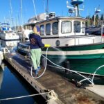 Valentina Shevchenko Instagram - I was missing my lovely #NordicTug so much 😍 Taking care of this beauty, because hull out and bottom painting are next ⏭️ 🥾 @hukgear #WashingtonState #PugetSound #FallVibes #OnWater #Navigation #Sailor #Captain #travel #traveldiaries #travelphotography #travelnow Puget Sound, Washington