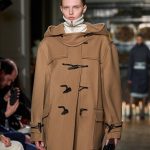 Victoria Beckham Instagram - VICTORIA BECKHAM AUTUMN WINTER 2024 High collars and statement funnel necks become a seasonal motif, as seen on elegant outerwear. Styling: @Jane_How Production: @BureauBetak Casting: @Piergiorgio @DMCasting Make-Up: @FaraHomidi Makeup Looks: @VictoriaBeckhamBeauty Hair: @AnthonyTurnerHair Hair tools and Products: @WellaHair @GHDHair Nails: @AlexandraJanowski Video & Livestream: @BureauFuture Runway Photography: @BureauFuture Live Music: @MichelGaubert Online music: @Romanrpk Drinks: @DonJulioTequila @DashDrinks #VBAW24