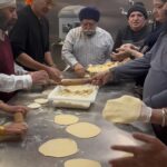 Vikas Khanna Instagram - Visited Plainview Gurdwara for blessings & peace. This was Radha’s 2nd favorite place in NY. I feel humbled that Bungalow Chef-coat is blessed by the priest. Inderjit Singh is like an elder brother, mentor & we used to work together at Spice Route almost 20 years ago on Fulton Street. He is one of my pillars of strength in America. Thank you Veerji. 24 Days To Go!
