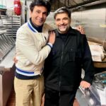 Vikas Khanna Instagram – The second book in BBC (Bungalow Book Club) has to be iconic Indian Home cooking by Suvir. 
I still remember walking into Barnes & Noble on 5th Avenue & seeing this book on the center table. (August 31, 2004)
I had witnessed amazing Indian food writers in America, but @suvirsaran single handedly changed the game & turned everything so personal about Indian cooking. 

My first self-published book on Ayurveda was dedicated to him in 2005. 

I’m so honored that during his recent trip to NY, he visited Bungalow’s library & the kitchen. 

A true friend. A legend. 20 Years of Indian Home Cooking legacy. 

19 Days To Go!