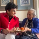 Vikas Khanna Instagram - Today I went to Mrs. Sabharwal for blessings for BUNGALOW NEW YORK. When I came to the US, I started working in small Indian restaurants & banquets right away. From cleaning homes to running errands to cat sitting to cooking in homes…..I did it all. But technically my first employer was Mrs. Sabharwal. About 24 years ago she gave me $101 while working in her home & blessed me that “one day May you cook for the Presidents.” This stayed with me forever. I never used the money until I had to get admission at Culinary Institute of America at a summer course. I waited for years to use her $101. Since that day, I seek her blessings for every new project I begin. I remember that on Oct 4th, 2011 when I received my first Michelin Star, I visited her next morning for blessing. She was happier than me & told me, “India won today.” 41 Days To Go #RabRakha