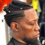 Wesley Snipes Instagram - #Coming2America behind the scenes magic made by @staceykutzlive 🙌🏿👑 Thank you for keeping General Izzi FRESH👑😎 Makeup by: @makeupbyvera7 “Coming 2 America” streaming now on Amazon Prime! @amazonprimevideo @zamundaroyals #coming2america #hairtransformation #royalhair #zamundaroyals #zamunda #blackhairstyles #wesleysnipes #daywalkerklique #behindthesceneshair #generalizzi #izzidoesit