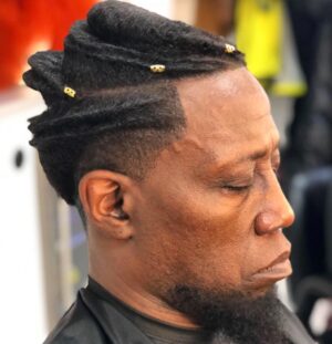 Wesley Snipes Instagram - #Coming2America behind the scenes magic made by @staceykutzlive 🙌🏿👑 

Thank you for keeping General Izzi FRESH👑😎

Makeup by: @makeupbyvera7 

“Coming 2 America” streaming now on Amazon Prime! 

@amazonprimevideo @zamundaroyals 

#coming2america #hairtransformation #royalhair #zamundaroyals #zamunda #blackhairstyles #wesleysnipes #daywalkerklique #behindthesceneshair #generalizzi #izzidoesit