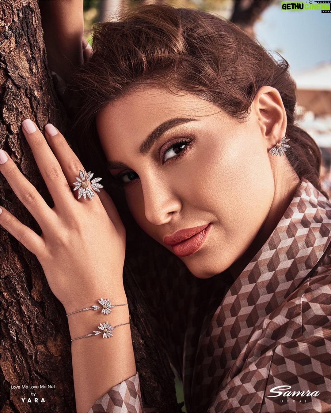 Yara - 26.3K Likes - Loading up on Daisies… 🌼
Discover the Love Me, Love Me Not Collection designed by Yara. An enhancement to femininity, purity and radiance. ❤️
#LoveMeLoveMeNot #Feminine #Radiance #Diamond #SamraDubai
@samrajewellery ✨
ما اجمل ورود الديزي.. 🌼
اكتشف مجموعة #بتحب_ما_بتحب التي صممتها يارا. تعزيز للأنوثة والتألق.
#Yara | #يارا
. . .
#Yaralb_lovers #YaraCollection #YaraFans #يارا_لوفرز #يارا_فانز