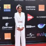 Yasmin Raeis Instagram - من افتتاح فيلم قمر ١٤ في مهرجان الجونة السينمائي الدولي Styled by @nada_hussam Dressed in @saraonsiofficial Hair @malaksamy_1 @alsagheersalons Makeup @mirnakauzman.mua Headpiece @halo.headpieces Earrings @dina.mourad Clutch @she.footwearegy #yasminraeis
