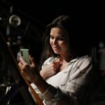Yosra El Lozy Instagram - Me saying “goodnight” to my daughters on video call while filming my latest series.. it can be so harsh being away from your kids when you are on set 18 hours daily.. thank you @ahmdhosne for capturing this moment أثناء إحدى مكالماتى مع بناتى و أنا بقولهم "تصبحوا على خير" لإنى بكون بعيدة عنهم و أنا فى التصوير لمدة ١٨ ساعة على الأقل يومياً.. دى فعلاً بتكون لحظة صعبة أوى علىّ و عليهم.. الله يكون فى عون كل الأمهات العاملات اللى بيتحطوا فى الظروف دى كتير