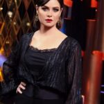 Yosra El Lozy Instagram - From my last TV interview, Styled by @maigalal jumpsuit from the Party Edit 2020 @pronovias by @figeypt Make up @monagamalmakeup Earrings @js_jewlery_byengyfayad Photo credit @mostafa_zidan.7