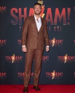 Zachary Levi Instagram - One more for the lewk. 📍🇮🇹 Grooming: @mnmachado Styled by: @warrenalfiebaker Suit: Custom @brooksbrothers Shoes: @louboutinworld Watch: @montblanc Necklace: @movado First photo ©️@marillasicilia/@mondadoriportfolio Photos: @warnerbrosuk @warnerbrosentertainment @shazammovie Rome, Italy