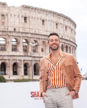 Zachary Levi Instagram - When in Rome… as they say! 💃🏻🇮🇹 

@parcocolosseo 

Grooming: @mnmachado 
Styled by: @warrenalfiebaker 
Lewk: @canali 
Shoes: @dukedexter 
Watch: @montblanc 

Photo: @warnerbrosentertainment