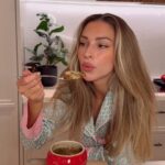 Zara McDermott Instagram – my homemade French onion soup, easy, delicious, and warming for these winter evenings.🤍✨

Peel and slice 1kg onions; they can be white or red it doesn’t matter! Cook them down with some butter and olive oil on a medium heat for around 25 minutes until they’re super soft and silky. 

Add a few diced garlic cloves (or garlic powder!) 1tsp salt, 1 heaped tbsp sugar and some balsamic vinegar to caramelise for a further 10 minutes, keeping the heat not too high so nothing burns. 

Add 200ml white wine and bring the heat up a little to cook it off for a few mins. Add some stock… I used around 1L of beef stock. Try and make sure its good quality as this will enhance the flavour, but don’t worry, any will do! Add a dash of Worcester sauce, a bay leaf, and taste. I added a bit more salt. Leave to simmer on medium heat for a further 20 mins.

While this was cooking down, I grated my cheese (I used Gruyere which is the cheese used traditionally, but you can use any cheese! Cheddar would work fine. I didn’t measure this, I just grated about 3/4 of a block lol!!. I also sliced my baguette and fried these off in some butter, When the soup was done, I added into oven proof dishes, assembled with some cheese, the baguette slices and then more cheese!!! Pop in the oven or under the grill until the cheese is melted. And VOILAAAA!
