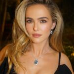 Zoey Deutch Instagram - so fun celebrating the new #tiffanylock collection - thank you for having me and my very big hair @tiffanyandco #tiffanypartner