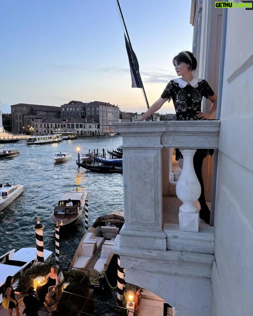 Zooey Deschanel Instagram - Of course, this is how I always stand on balconies and this photo is, in fact, NOT posed at all. The St. Regis Venice