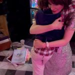 Zooey Deschanel Instagram – When your little guy hugs you for the whole song 🥹 Merry merry, everyone!