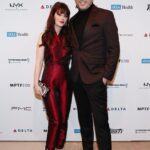 Zooey Deschanel Instagram - Archival @irisvanherpen from the amazing indigenous-owned designer vintage shop @FarmerJawns for the Night Before ❤️ Styling: @ibabdelnasser Hair: @brentsmells Makeup: @missjobaker Jumpsuit: @irisvanherpen Shoes: @rogervivier Jewelry: @nickhorey @the_ninon Clutch: @carolinaherrera