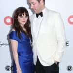 Zooey Deschanel Instagram - Paying tribute to the icon @viviennewestwood at the Elton John AIDS foundation Academy Awards party. ❤️❤️❤️ Styling: @ibabdelnasser Hair: @evaniefrausto Makeup: @missjobaker Dress: @viviennewestwood Shoes: @rogervivier Jewelry: @official_mikimoto Bag: Vintage Schiaparelli