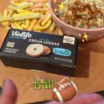 Alexis Nikole Nelson Instagram - ONIONGRASS + SPORTBALL 🏈 = A TASTY TIME I made this super tasty dip using @Violifeus dairy free Cream Cheese and everyone’s favorite lil allium scamp, Oniongrass (Allium vineale!). I must confess, this recipe is bomb. This new Violife cream cheese block is bakeable and cookable which makes it versatile for any dish for all sportsball games! Click le link in bi0 for dairy free recipe swaps using Violife! Like this one! I love that this is what I get to do for my job!! happy big Sportball time to those who observe! #violifepartner PS; Fun Fact Alert: Did you know that this year’s halftime performer also really enjoys plant-based foods? He’s got great taste!