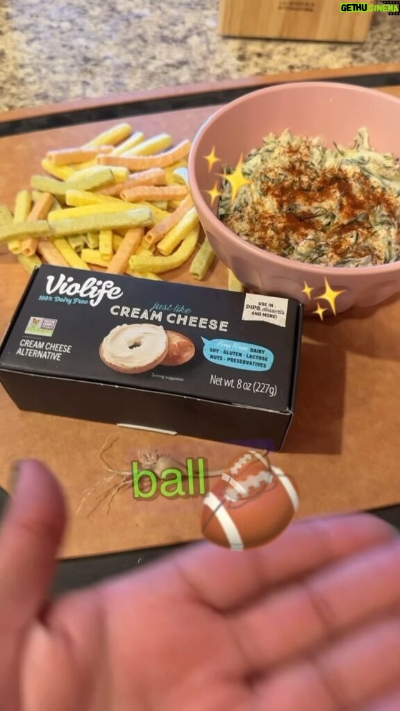Alexis Nikole Nelson Instagram - ONIONGRASS + SPORTBALL 🏈 = A TASTY TIME I made this super tasty dip using @Violifeus dairy free Cream Cheese and everyone’s favorite lil allium scamp, Oniongrass (Allium vineale!). I must confess, this recipe is bomb. This new Violife cream cheese block is bakeable and cookable which makes it versatile for any dish for all sportsball games! Click le link in bi0 for dairy free recipe swaps using Violife! Like this one! I love that this is what I get to do for my job!! happy big Sportball time to those who observe! #violifepartner PS; Fun Fact Alert: Did you know that this year’s halftime performer also really enjoys plant-based foods? He’s got great taste!