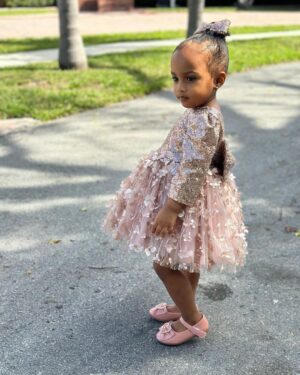 Amara 'La Negra' Instagram - My Little Ladies!  @lasroyaltwins So Bougie with There Babies Hermes Purse from @coolkidznyc I’m so In love with them.. Enamorada de Mis Bebés 👧🏽👧🏽 #SumajestadRoyalty #SualtezaEmpress 
Dress; @rubybellebaby