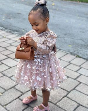 Amara 'La Negra' Instagram - My Little Ladies!  @lasroyaltwins So Bougie with There Babies Hermes Purse from @coolkidznyc I’m so In love with them.. Enamorada de Mis Bebés 👧🏽👧🏽 #SumajestadRoyalty #SualtezaEmpress 
Dress; @rubybellebaby