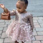 Amara 'La Negra' Instagram - My Little Ladies! @lasroyaltwins So Bougie with There Babies Hermes Purse from @coolkidznyc I’m so In love with them.. Enamorada de Mis Bebés 👧🏽👧🏽 #SumajestadRoyalty #SualtezaEmpress Dress; @rubybellebaby