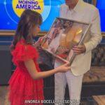 Andrea Bocelli Instagram - SO SWEET: Watch @andreabocelliofficial present a special plaque to his daughter, Virginia, backstage at GMA. ❤️🥹 “A Family Christmas” was the best-selling new Christmas album of 2022 and also Virginia’s first album and first gold record.
