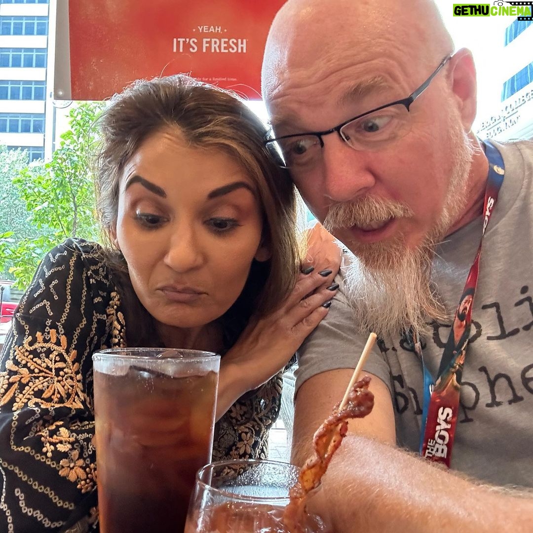 Anjali Bhimani Instagram - Awesome August Day 6 - Fond Reunions with Dear Friends! I am so so so grateful that life brings me to so many places that I get to reunite with dear friends all over the world, including this big, sweet fella who I’ve known for longer than I usually admit I’ve been alive. @greggessex I still have so many fond memories of our geekdom and goofiness together, of sharing art and wonder, and being in awe of your ability to figuring out pretty much ANYTHING works or is made. Here’s to catching up after far too many years, and here’s to life keeping you healthy and happy. Such an unexpected and wonderful joy to get to see you at @gen_con ! . . . . . #gamers #oldfriends #doglovers #northwestern #northwesternuniversity #wildcats #anjalibhimani #iamfunsize