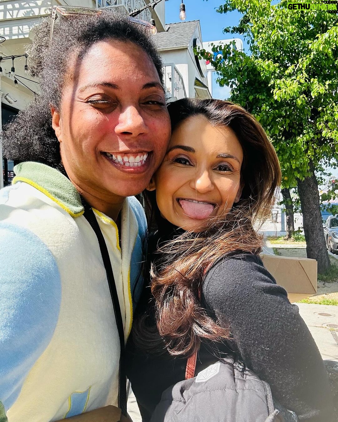 Anjali Bhimani Instagram - When you head to breakfast to fill up your belly and @quiddie fills up your whole heart. Happy #tongueouttuesday loves! (PS Coffee and magic plans were both a-brewin’…stay tuned.) #aabriaiyengar #anjalibhimani #d20 #criticalrole #tongueout #ttrpg #dungeonmaster #gamemaster Aeirloom Bakery